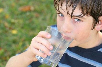 boy drinking a glass of water Image source -- https://www.flickr.com/photos/21178966@N04/4976984968/sizes/o/